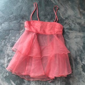 out from under pink silk and sheer ruffle top